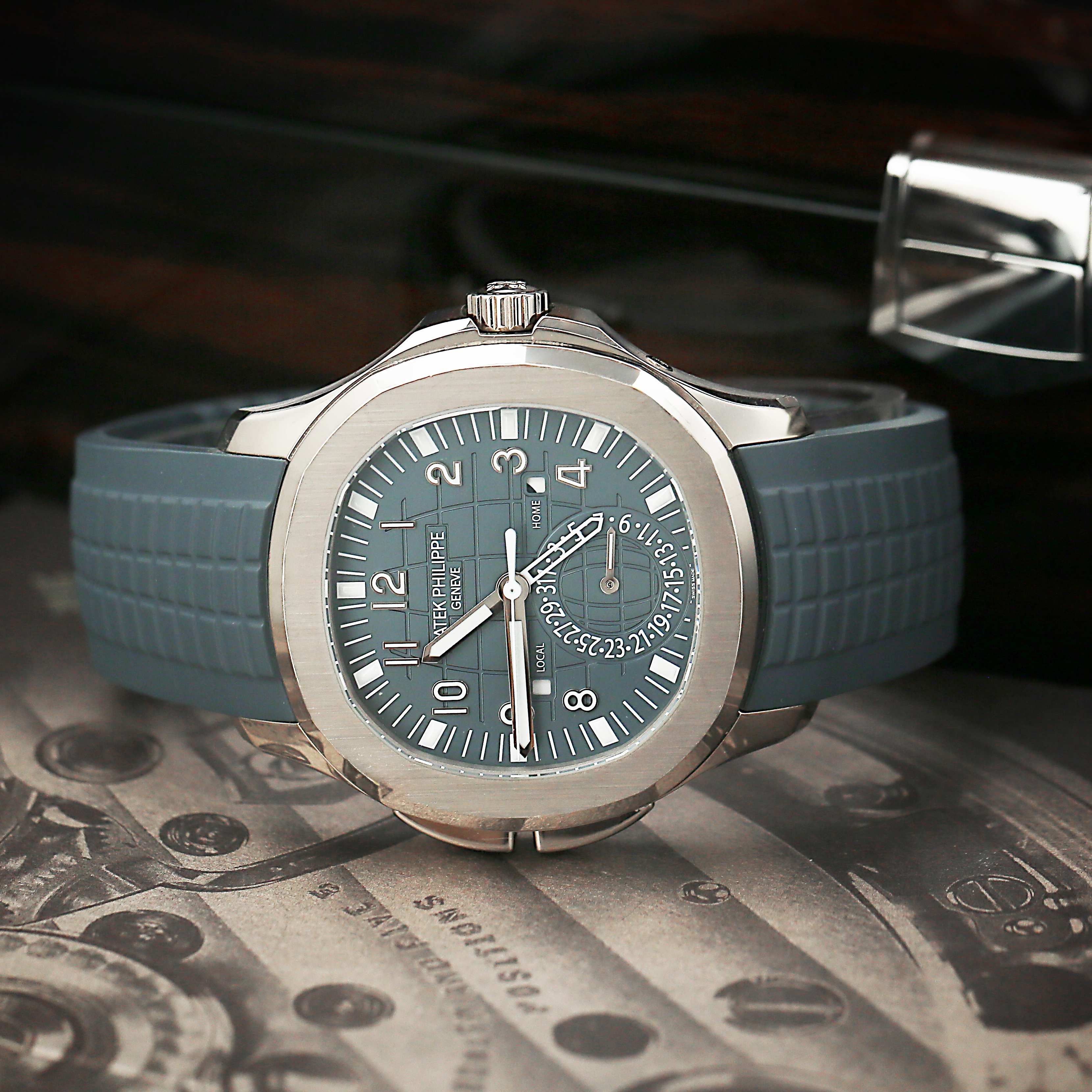 Patek Philippe 6164A blue strap and green dial on a textured surface