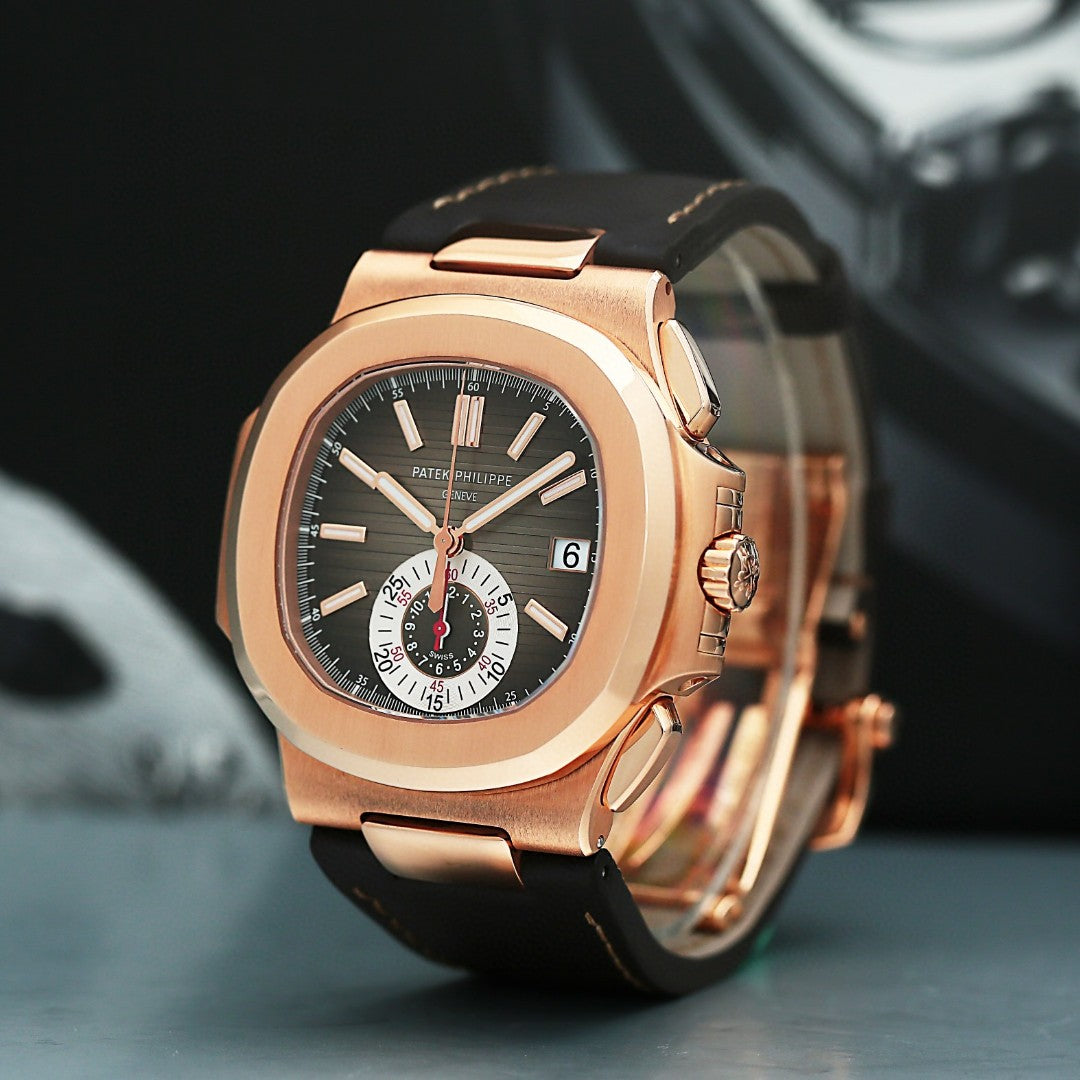 Patek Philippe 5980R  with rose gold case and black strap on a dark background