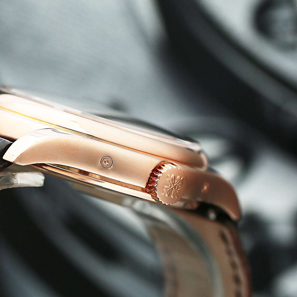 Close-up of a rose gold Patek Philippe 5146R Crown